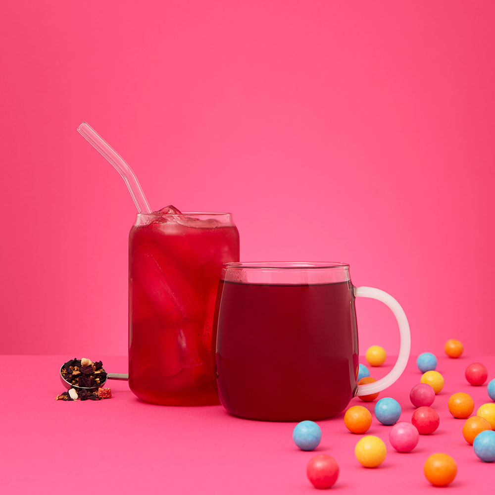 bubblegum pop! tea hot and iced tea and spoon with loose leaf tea leaves inside and bubblegum balls