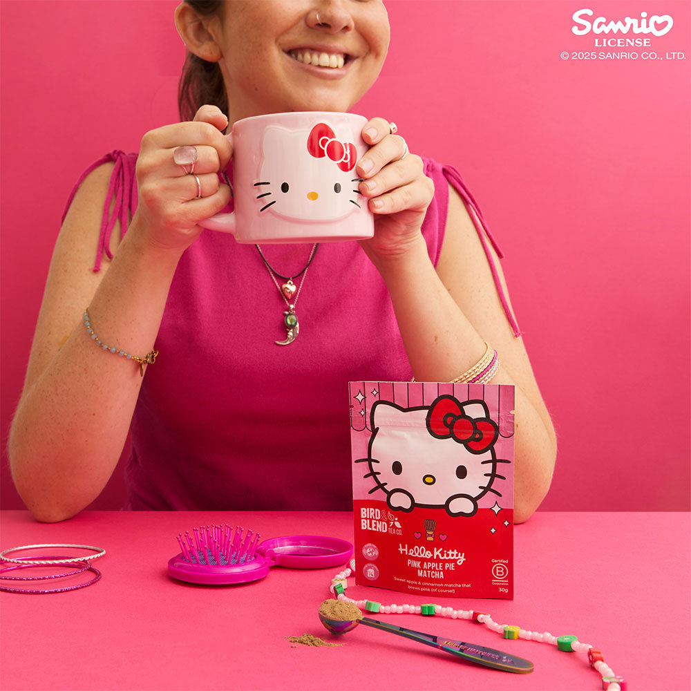 Hello Kitty pink apple pie matcha pouch with spoon and mug enjoying