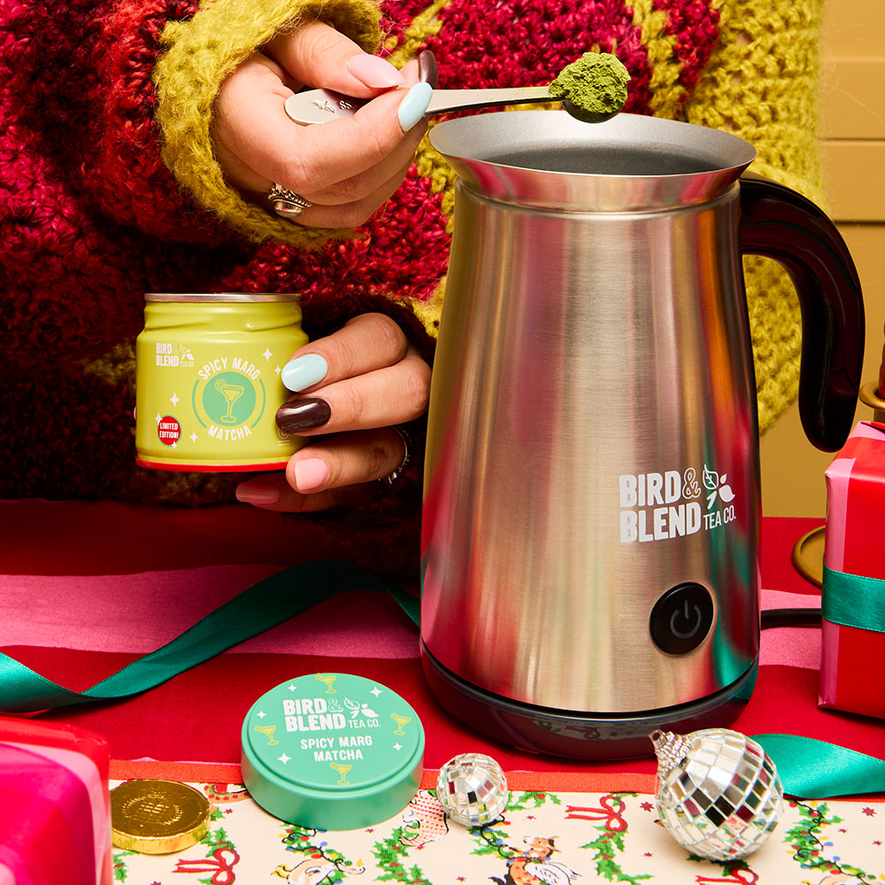 spicy marg matcha and perfect matcha spoon pouring matcha into the stainless steel matcha latte magic whisk