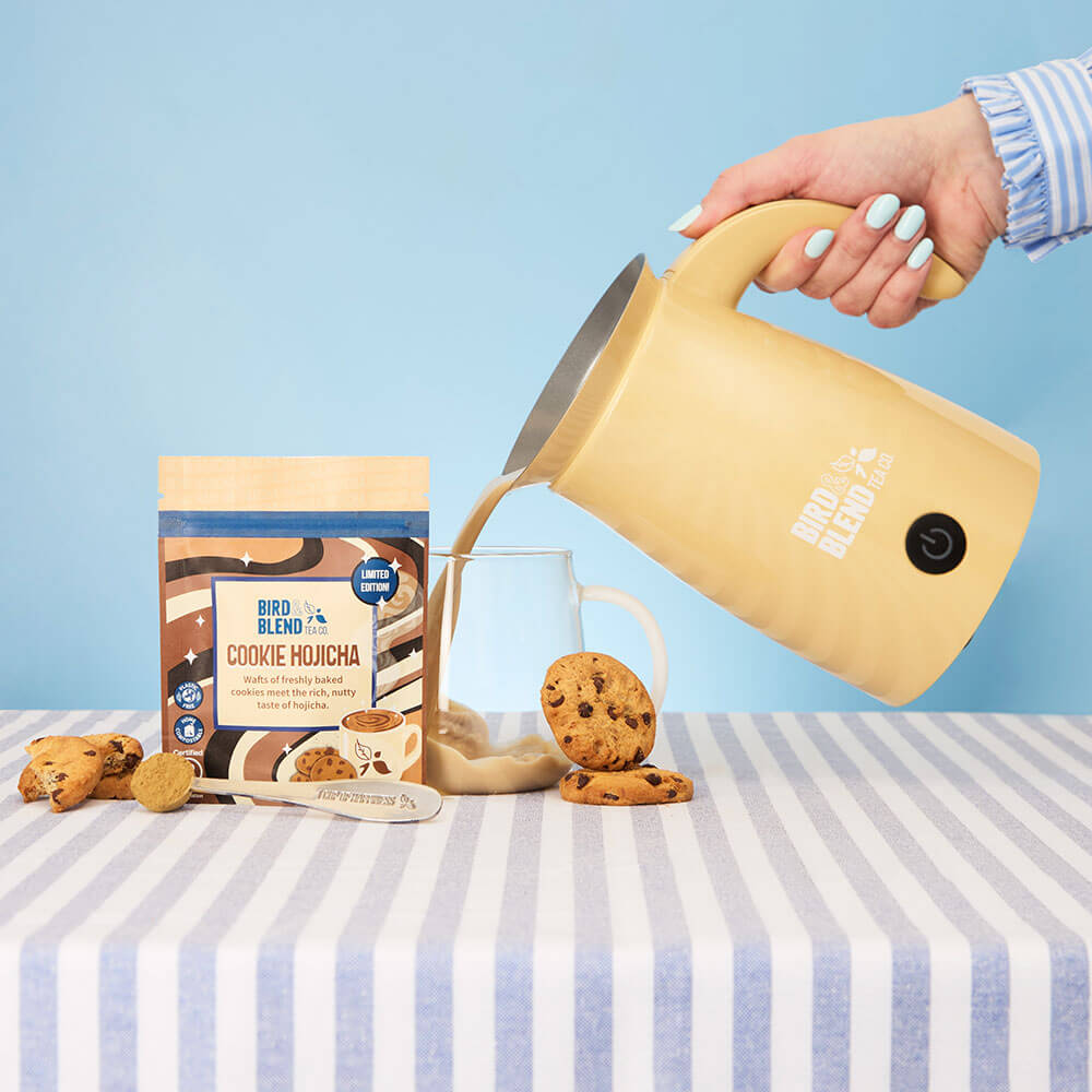 Cookie Hojicha tea powder pouch &amp; latte pouring from bamboo magic whisk &amp; spoon &amp; cookie
