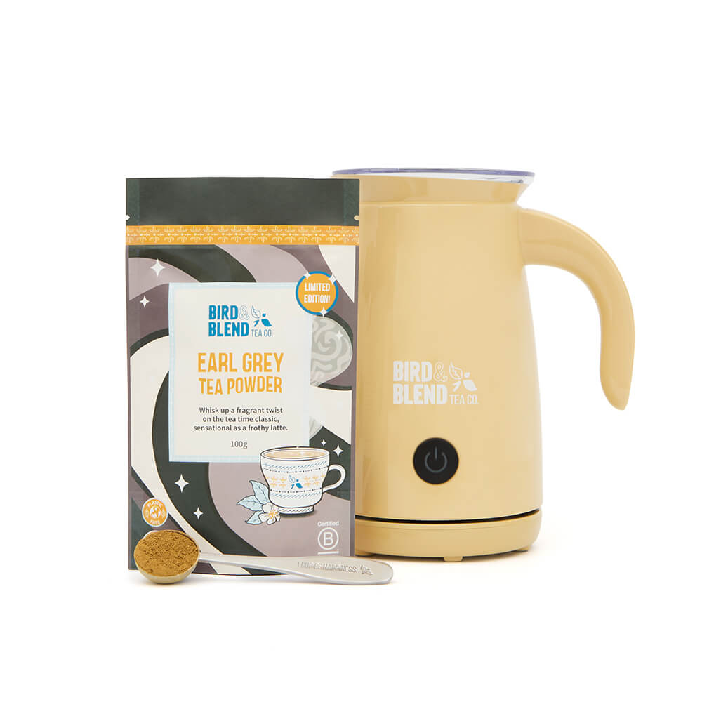 earl grey tea powder and spoon and bamboo gloss magic latte whisk