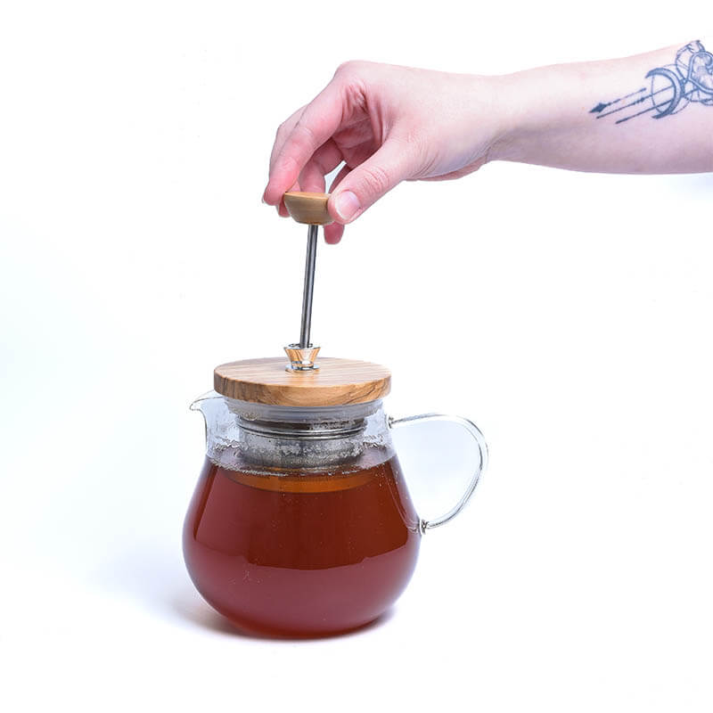 glass infuser teapot being used