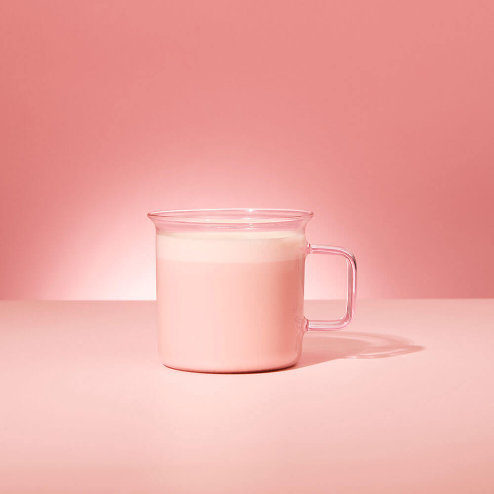 pink matcha latte in pink matcha tea glass mug