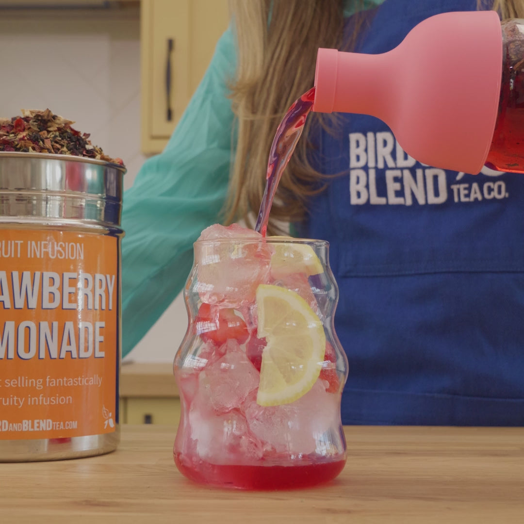 how to make cold brew tea video with pink cold brew tea bottle and strawberry lemonade fruit tea
