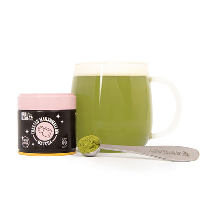 toasted marshmallow matcha tin &amp; spoon filled with matcha tea powder &amp; hot matcha latte