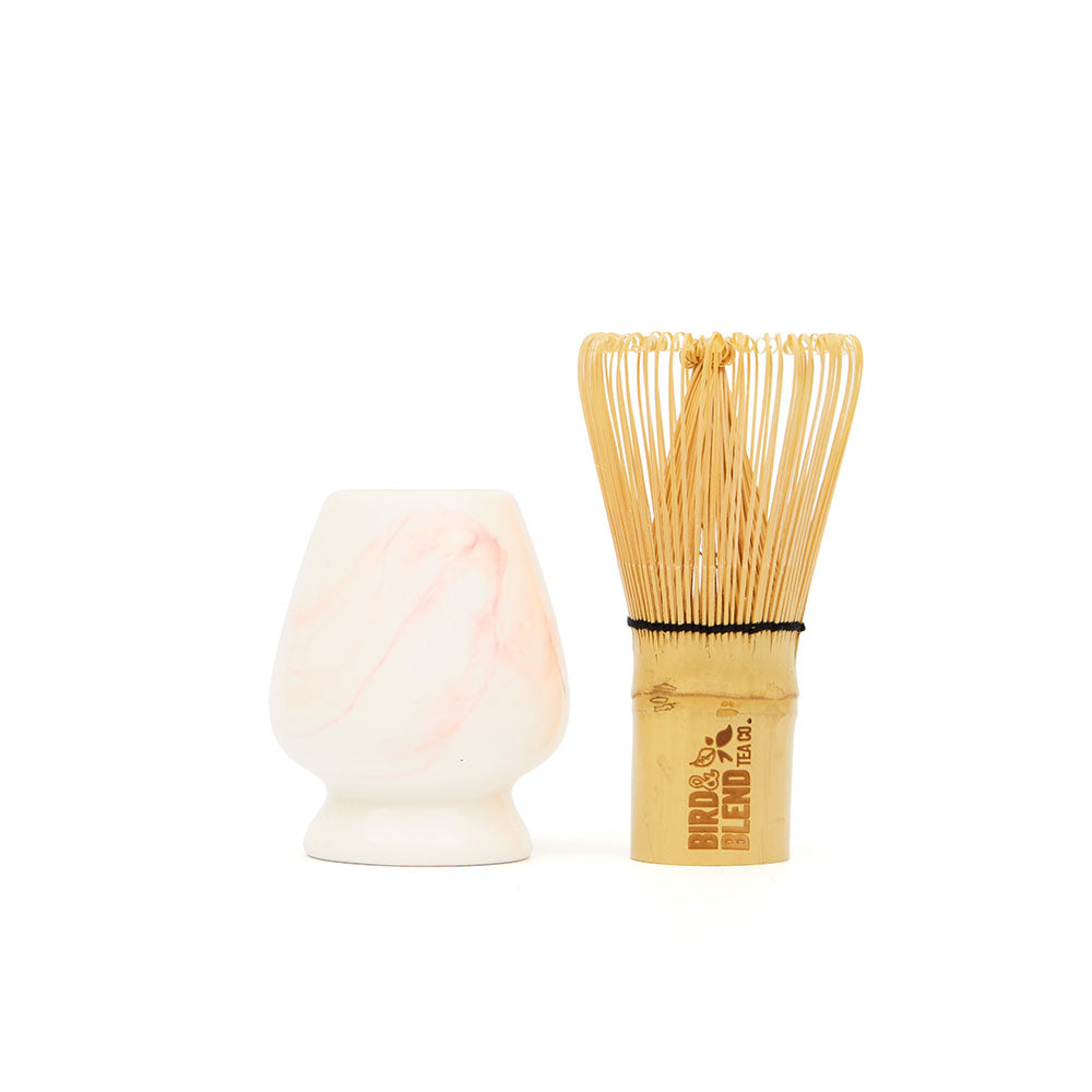 white and pink marbled matcha tea whisk holder and traditional bamboo whisk